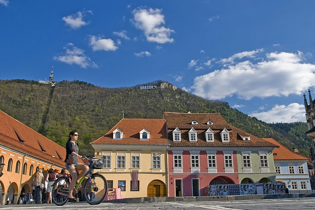 Baroque, gothic and renaissance architecture sit side-by-side in Brasov, which also boasts a Hollywood-style sign in the hills. Picture: Tim Pile