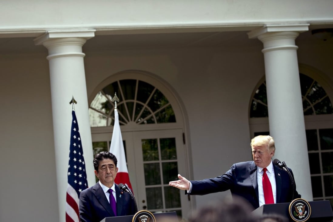 US President Donald Trump speaks as Shinzo Abe, Japan's prime minister, listens during a news conference in the Rose Garden of the White House in Washington, D.C. on Thursday, June 7, 2018. Photo: Andrew Harrer/Bloomberg