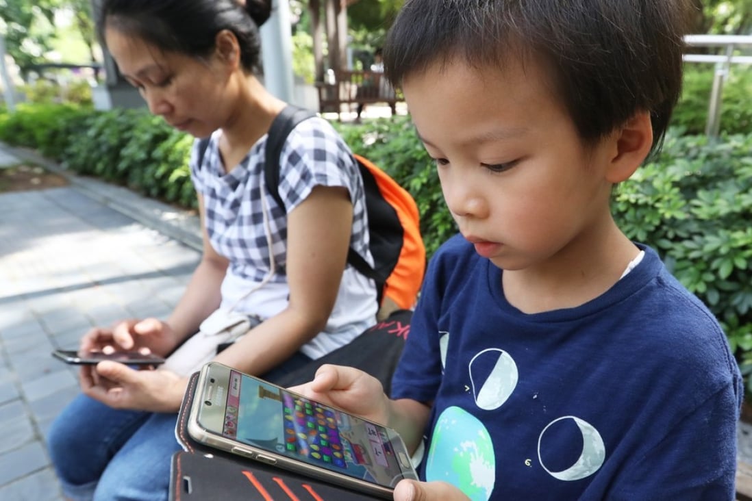 Smartphone addiction is a particular problem when it comes to children, something that both Apple and Google are trying to address with their new features. Photo: Edward Wong