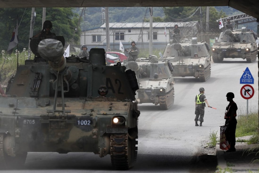 South Korean K-55 self-propelled howitzer artillery relocate after participating in a defence exercise at the Mugeon-ri drill field near the demilitarised zone in Paju, Gyeonggi-do, South Korea, on June 19. In the wake of the Trump-Kim summit, South Korea and the US announced this week that they are suspending their joint military exercise scheduled for August. Photo: EPA-EFE