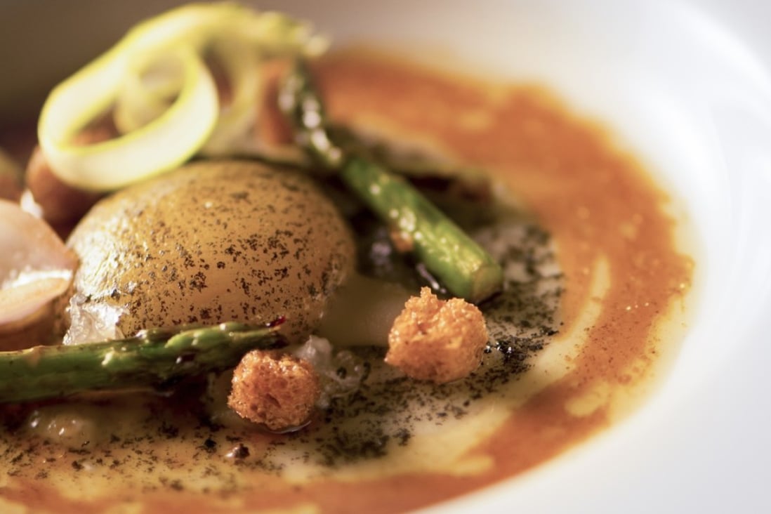 This handout image shows a dishes of Egg gruyere ravioli from Ultraviolet in Shanghai. Photo: Scott Wright