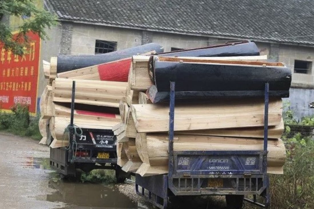 Thousands of coffins were handed over in Gaoan county, Jiangxi province, last week as China promotes cremation. Photo: Thepaper.cn