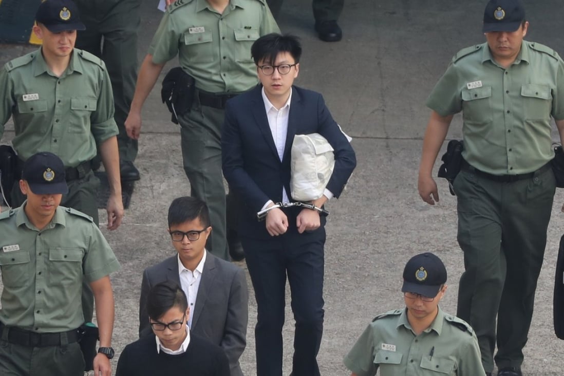 Defendants of the Mong Kok riot trial (from centre down) Edward Leung Tin-kei, Ken Lo Kin-man and Wong Ka-kui are escorted by prison officers to attend trial at the High Court on May 21. All three were later found guilty of the charge of rioting and sentenced to jail terms of between 3½ and seven years. Photo: Winson Wong