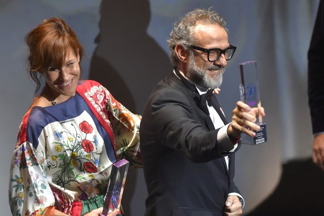 Italian chief Massimo Bottura receives the top award for Osteria Francescana during the World's 50 Best Restaurants awards in Spain. Photo: AFP