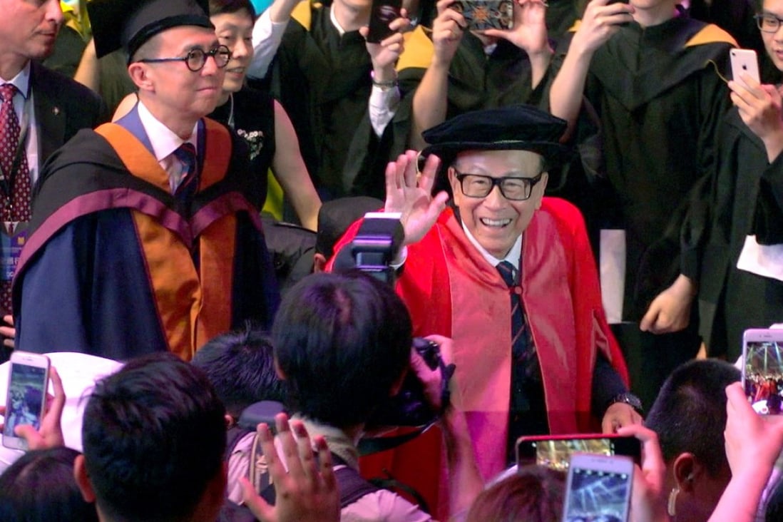Li Ka-shing (centre) receives a rock-star welcome at the Shantou University graduation ceremony, where he announced he would pass his lifelong mission to improving education to his son, Richard (left). Photo: Thomas Yau