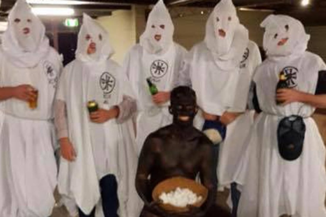 Charles Sturt University students dressed as klansmen and their black slave for a 'politically incorrect' end-of-term party. Photo: Instagram