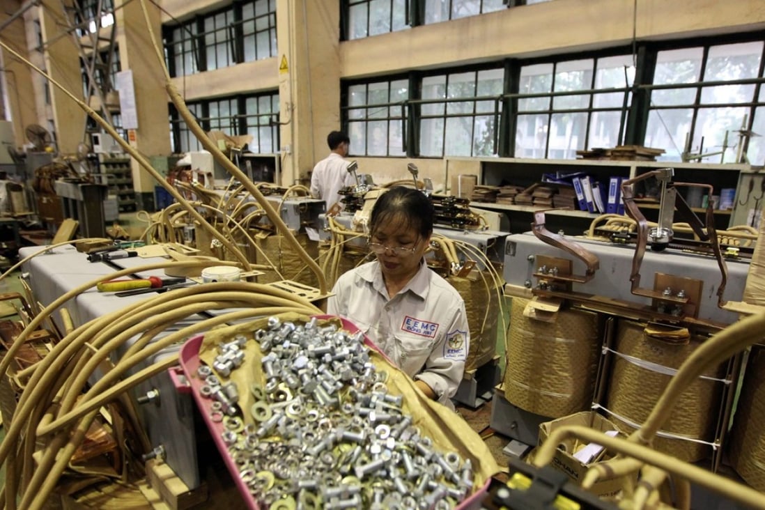 Trade tensions have accelerated the movement of investment into Vietnam, which is home to Dong Anh Electrical Equipment’s transformer making workshop in Hanoi. Photo: EPA