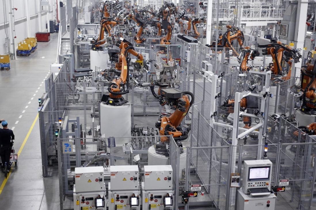 Robots weld car body components for vehicles at the BMW assembly plant in Greer, South Carolina. Photo: Bloomberg