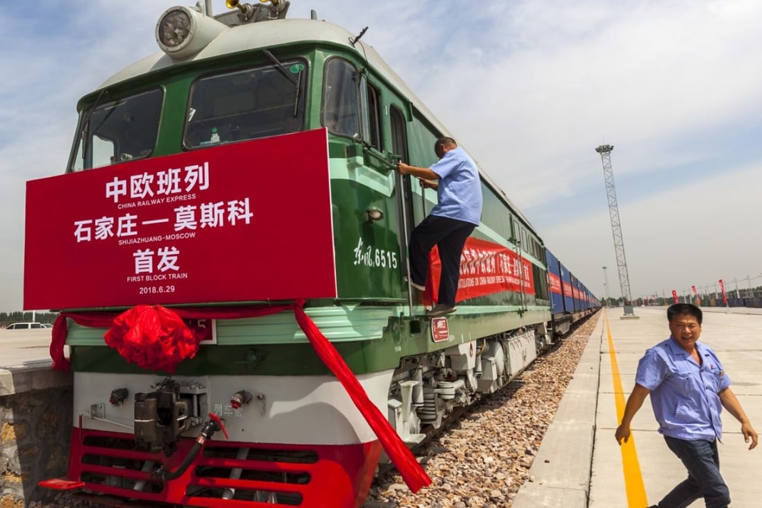 Railway workers prepare the first train for departure from Shijiazhuang, China to Moscow in Shijiazhuang, Hebei province. The launch of the China Railway Express China-Europe line is part of the Belt and Road Initiative. Photo: EPA