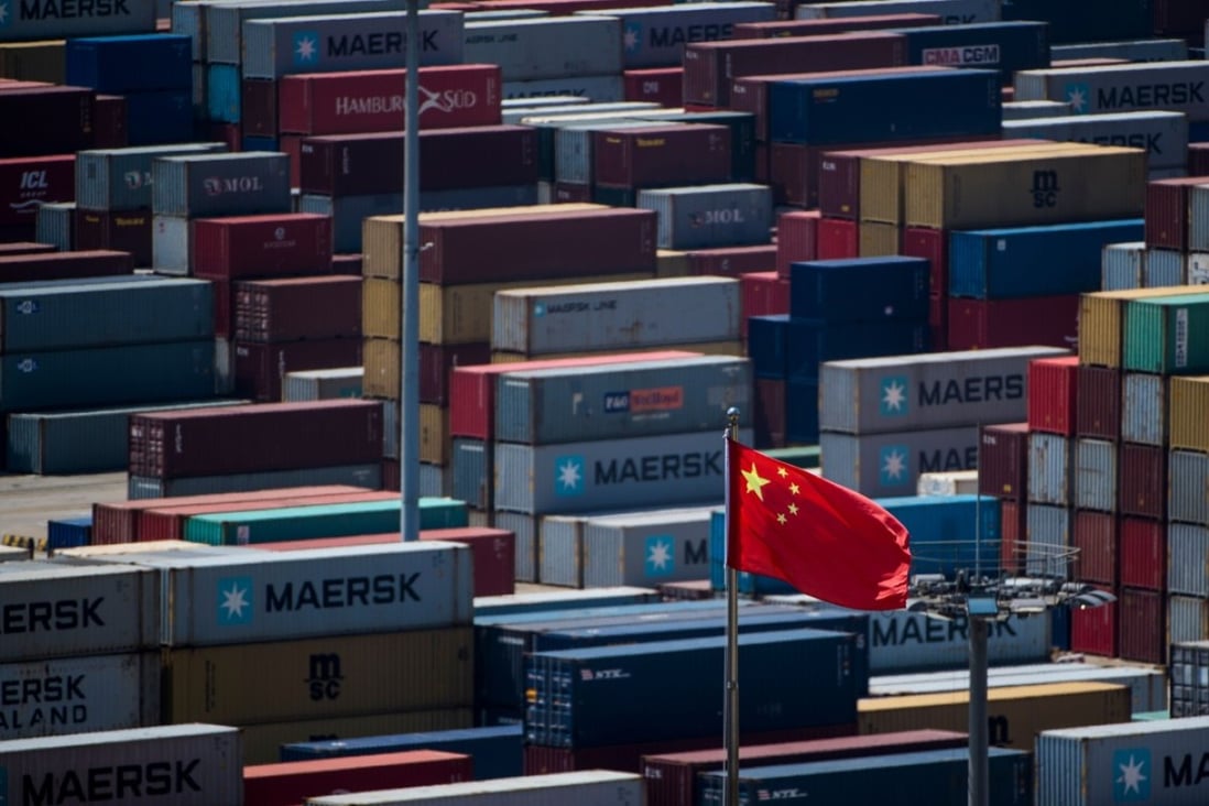 Containers at the Yangshan deep water port in Shanghai. The first shots in a trade war between the US and China have been fired with tit-for-tat tariffs announced on July 6. Photo: AFP