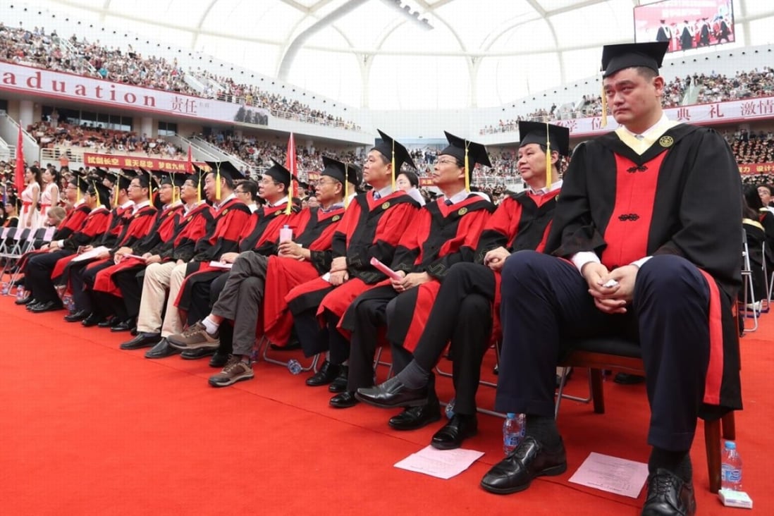 Chinese basketball legend Yao Ming attends the graduation ceremony after earning his degree in economics from Shanghai University. Photo: Twitter