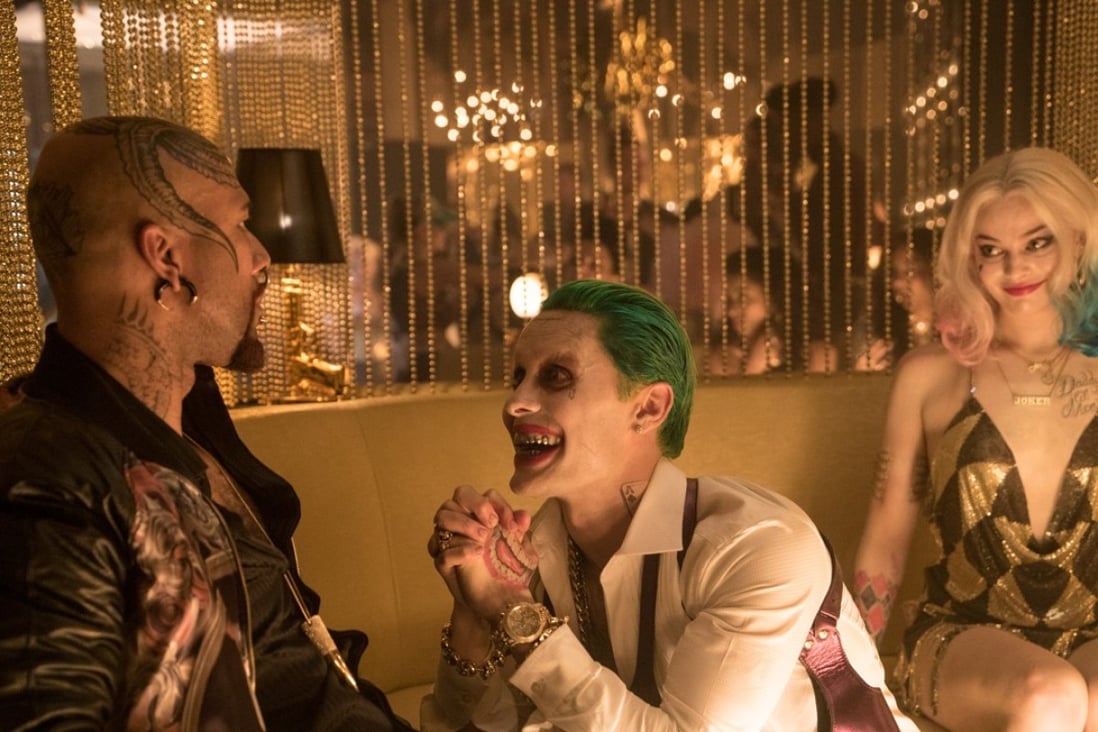 Jared Leto (centre) as the Joker and Margot Robbie (right) as Harley Quinn in Suicide Squad. Photo: Clay Enos