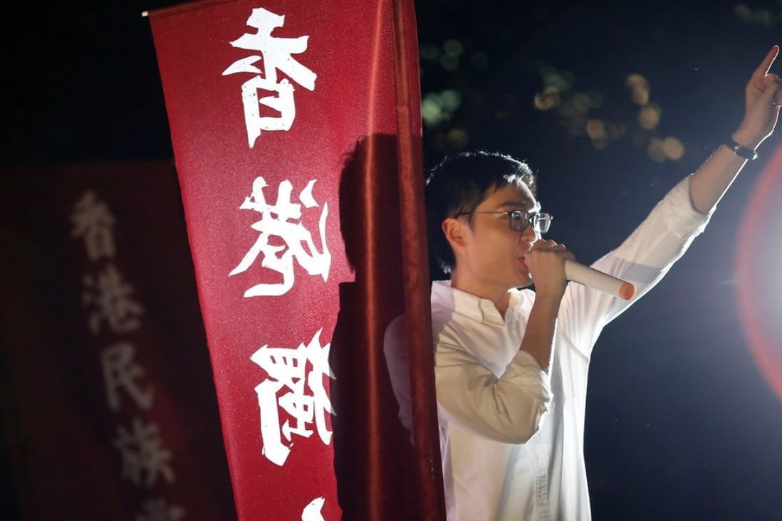 Hong Kong National Party convenor Chan Ho-tin speaks during a protest rally. His party could soon be outlawed. Photo: Reuters