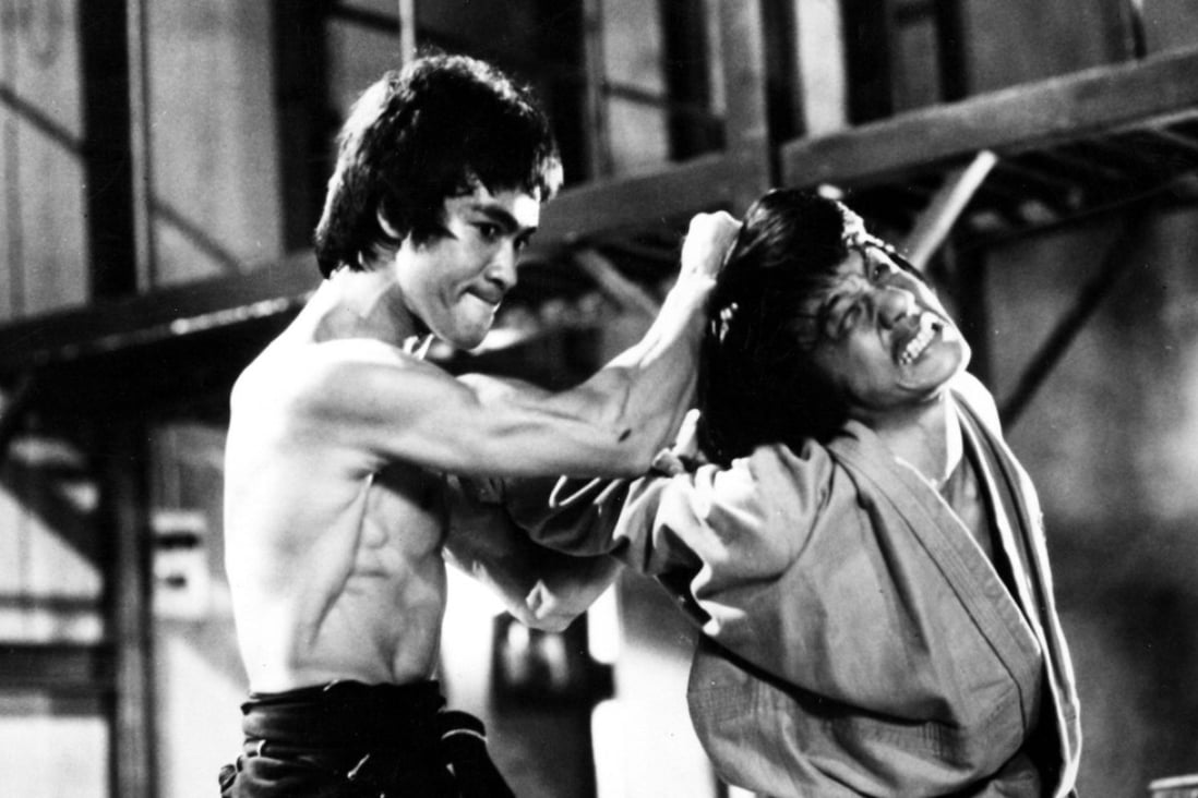 Bruce Lee and Jackie Chan in a scene from Enter The Dragon. After Lee’s death, film director Lo Wei tried to groom Chan as Lee’s replacement, but the actor went his own way. Photo: Alamy