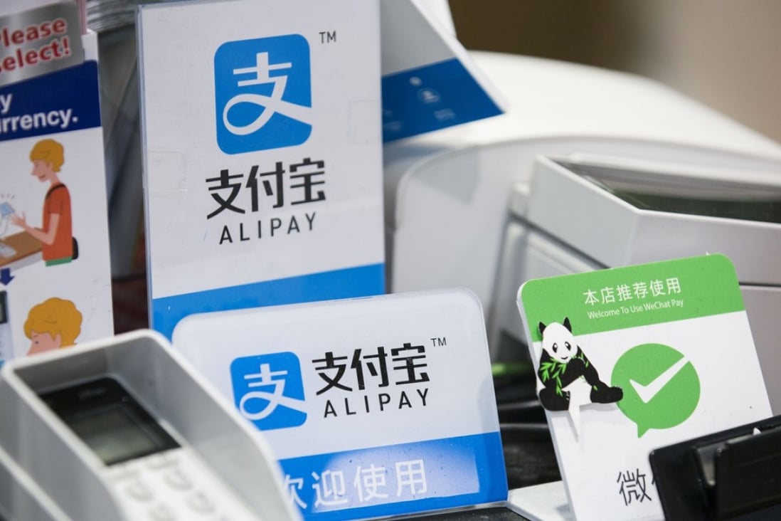 Alipay and Tenpay were each fined 600,000 yuan for breaking the rules on foreign exchange transactions. Photo: Bloomberg