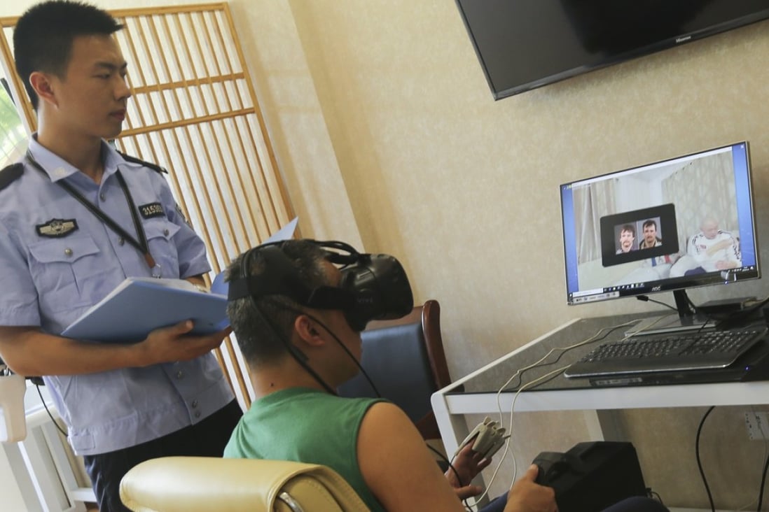 An addict wearing a virtual reality headset watches images of a man before and after abusing drugs. Photo: Cao Lei