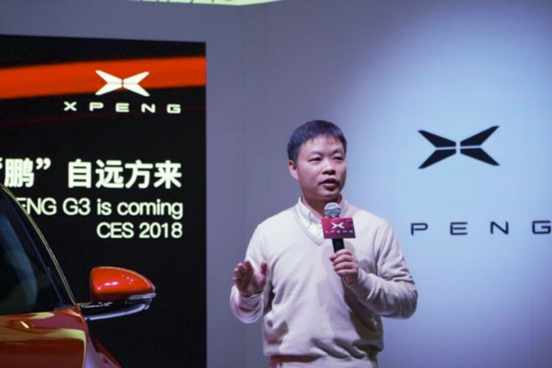He Xiaopeng, co-founder and chairman of Xiaopeng Motor, unveils the company's first production car at CES trade show in Las Vegas in January. Photo: Handout