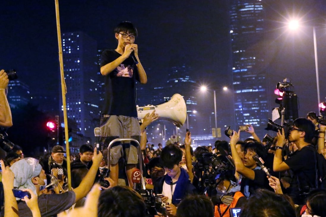 Joshua Wong delivers a speech outside the chief executive's office in Admiralty during the Occupy movement in 2014. Photo: SCMP