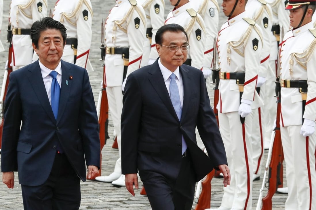 Japanese Prime Minister Shinzo Abe (left) highlighted Chinese Premier Li Keqiang’s visit to Japan in May, saying he was “very pleased to have Japan-China relations return to a normal path”. Photo: EPA-EFE