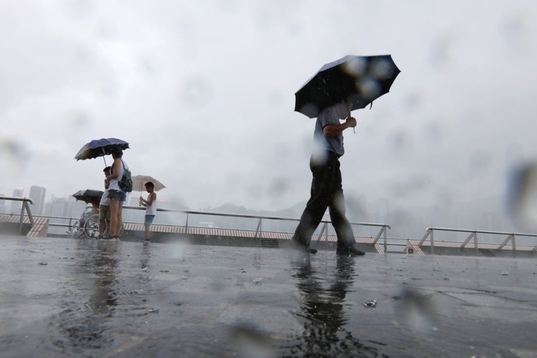 Rain bands associated with Tropical Storm Bebinca brought squally showers to Hong Kong on Tuesday. Photo: Felix Wong