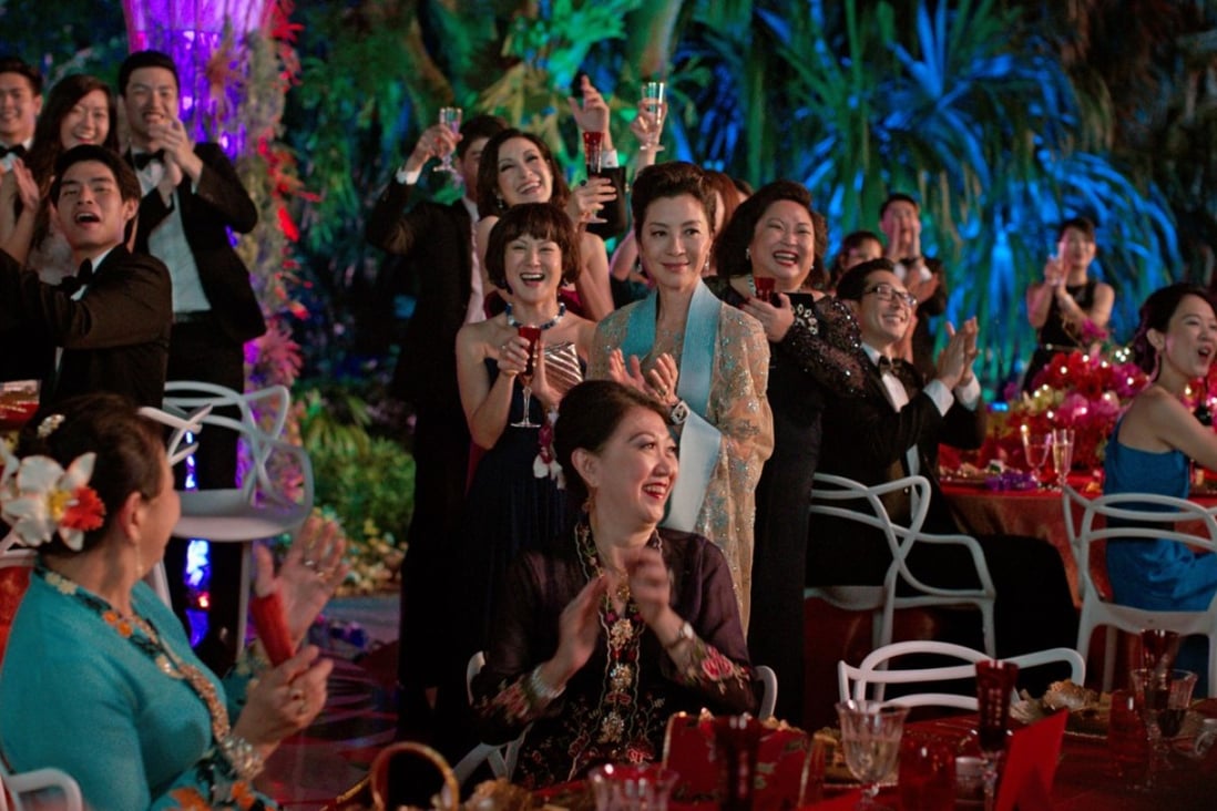 Michelle Yeoh (centre) stars as influential matriarch and socialite Eleanor Young in Crazy Rich Asians.