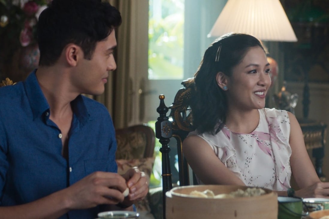 Henry Golding (left) as Nick Young and Constance Wu as Rachel Chu in a still from Crazy Rich Asians.