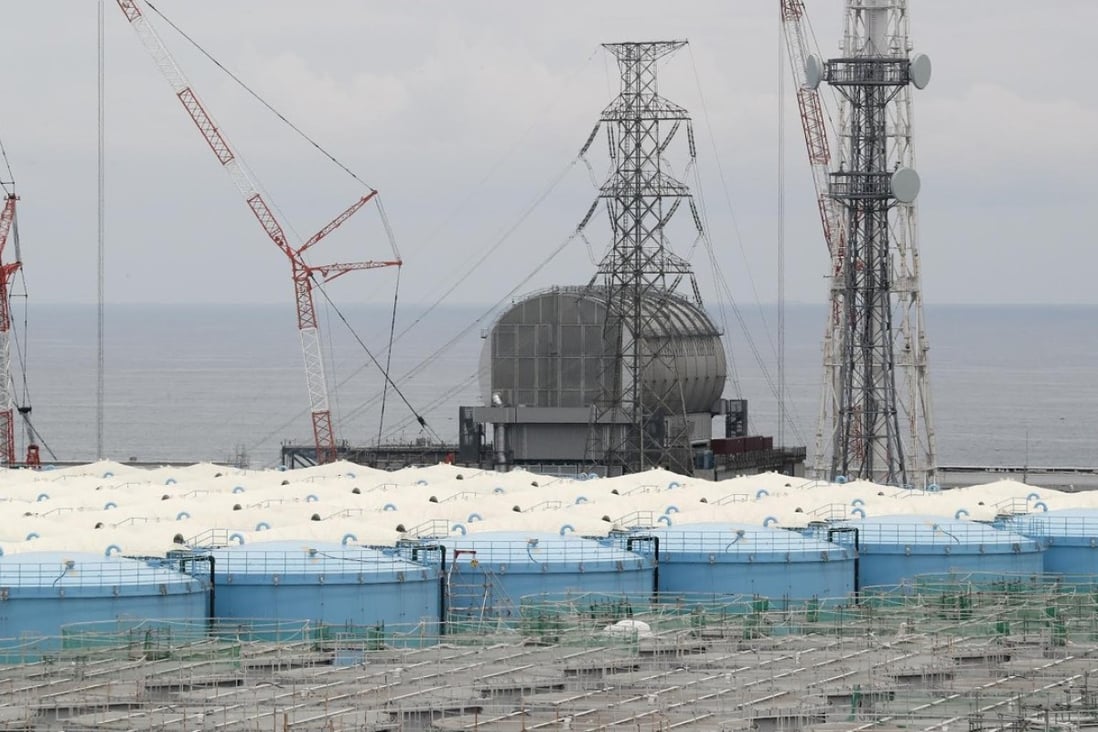 Reactor 3 and tanks storing the radioactive water at the Fukushima Dai-ichi nuclear power plant. Photo: AFP