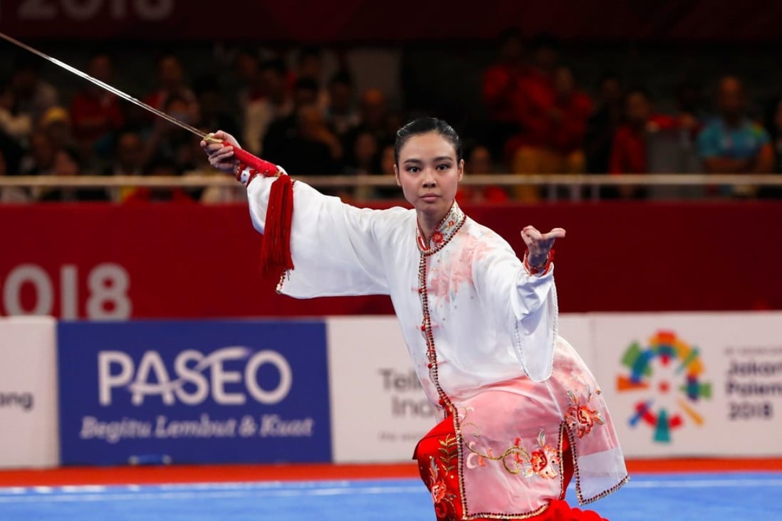 Indonesia’s Lindswell Kwok on her way to gold in wushu. Photo: Reuters
