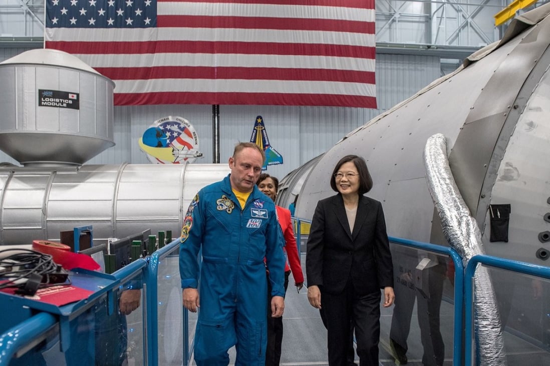 Taiwanese President Tsai Ing-wen (right) tours the Johnson Space Centre in Houston accompanied by US astronaut Edward Michael Fincke on Sunday. Photo: EPA-EFE
