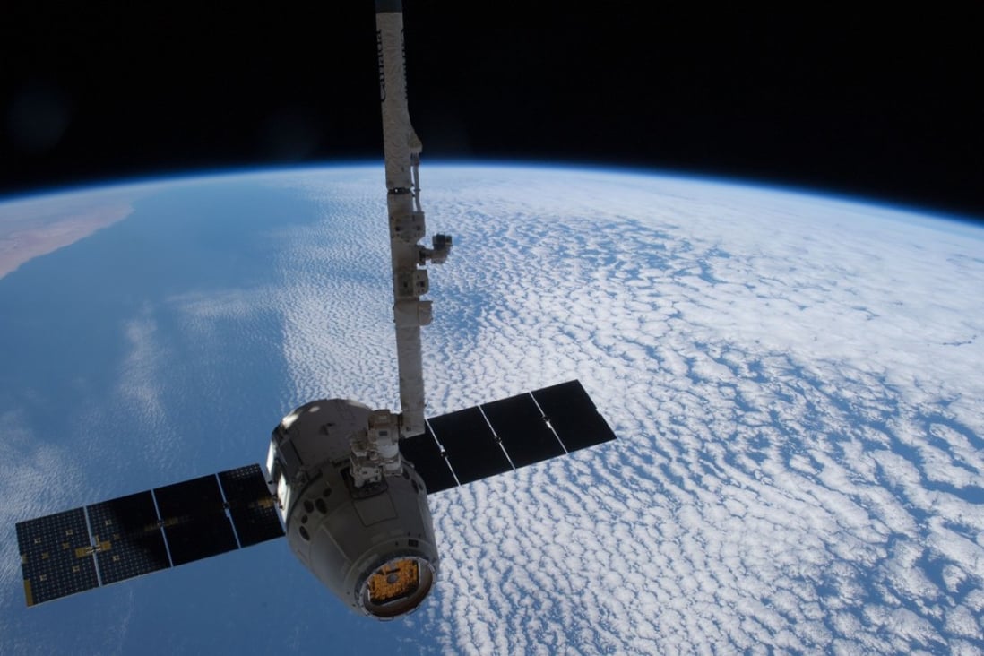 This image provided by Nasa shows the SpaceX Dragon cargo craft just prior to being released by the International Space Station's Canadarm2 robotic arm in 2012. Photo: AP/Nasa