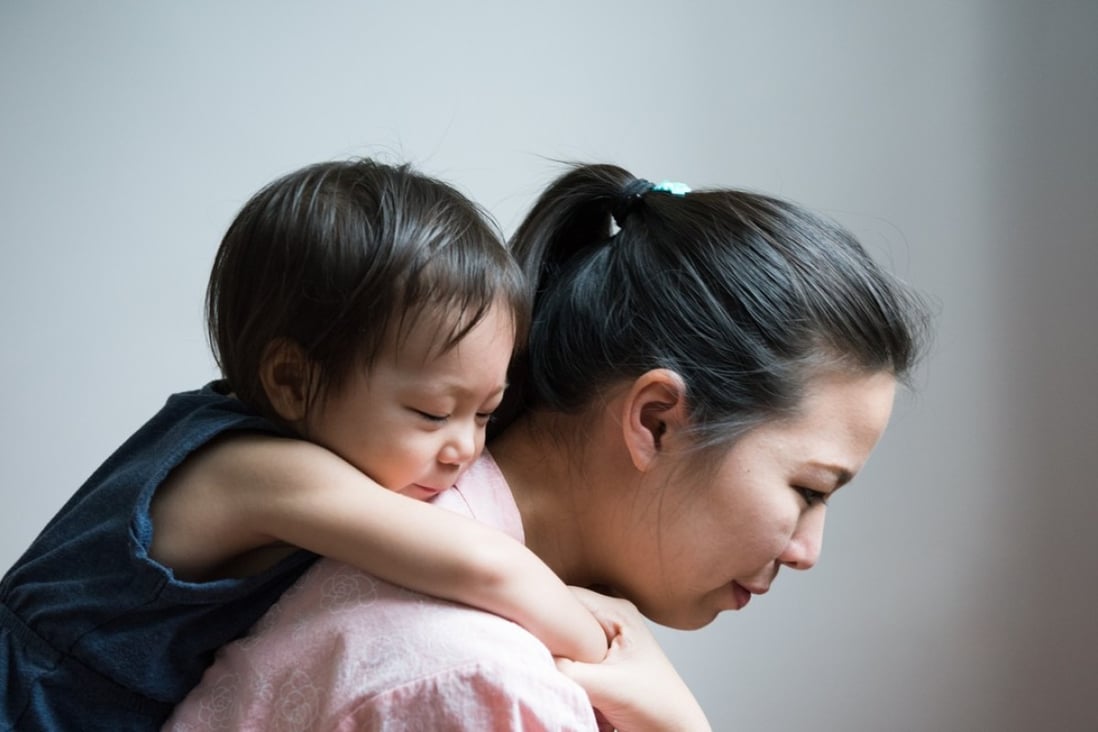 mother and daughter. Mother holding daughter on her back. Photo: Shutterstock