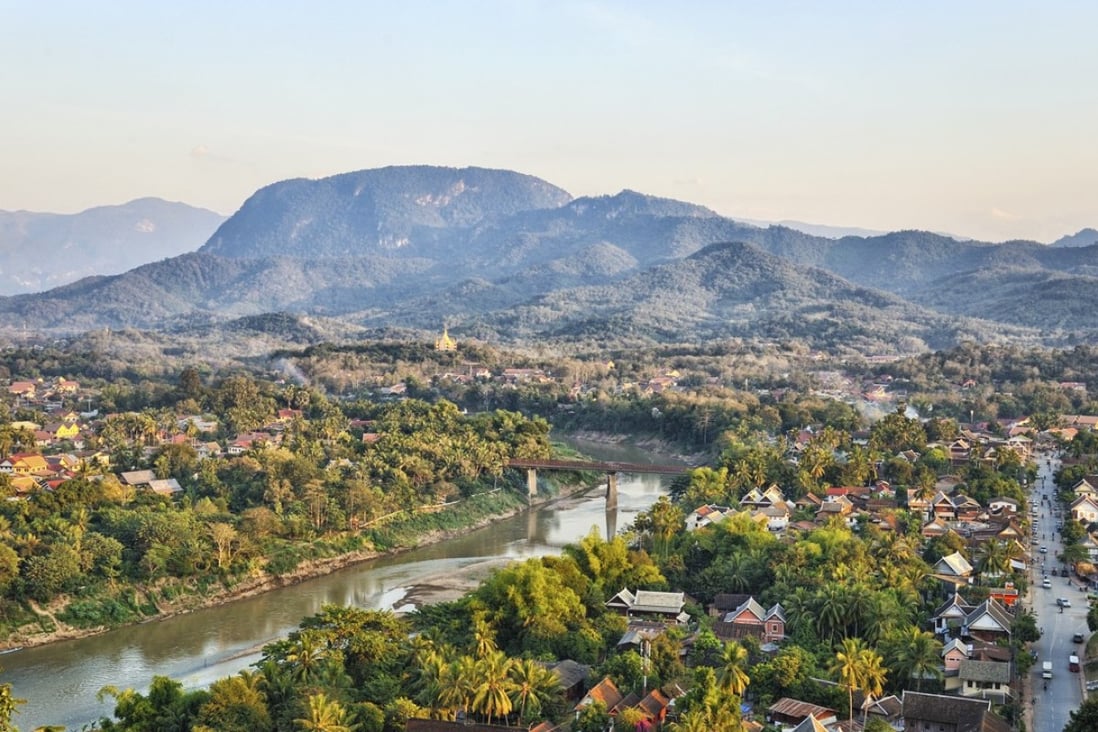 Nam Khan River and Luang Prabang. Laos is facing increasing tourist numbers from the upcoming Laos-China Railway. Photo: Alamy