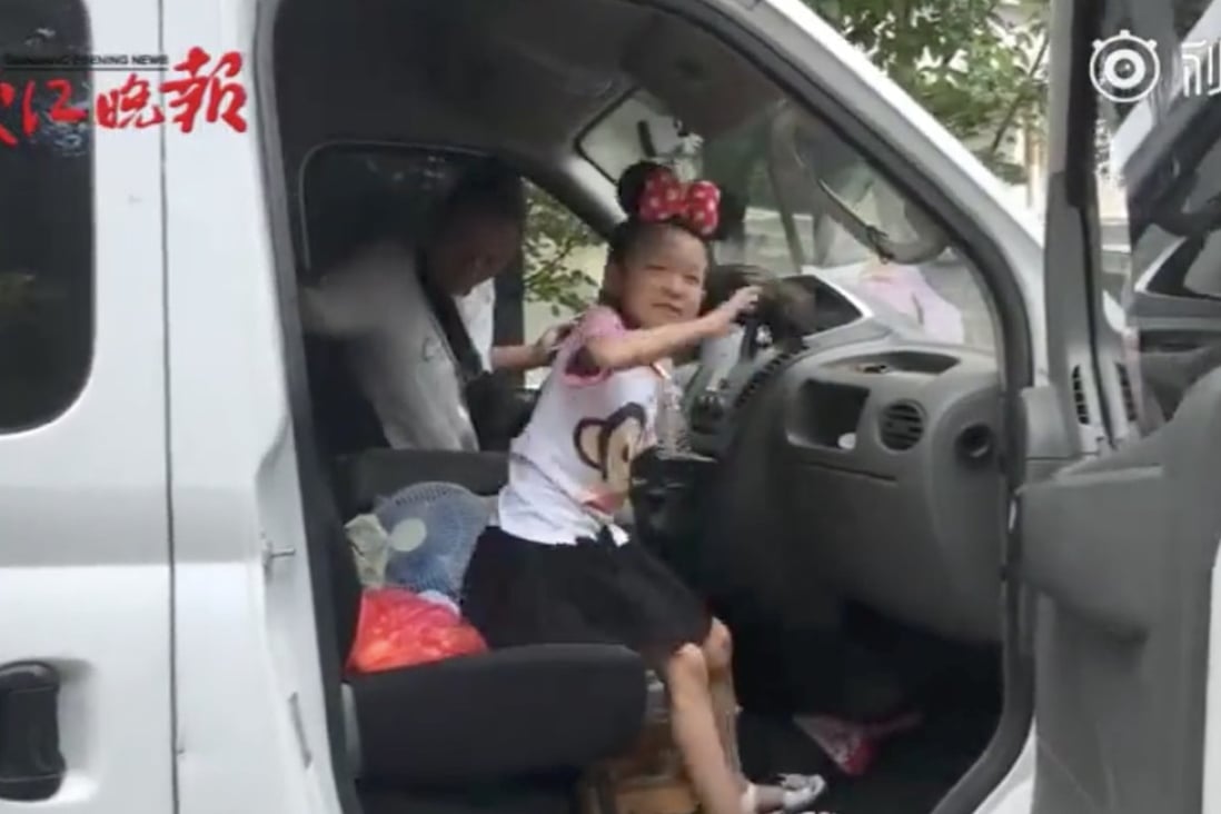 Miaomiao is taken with her mother in the van rather than be left with her ageing grandparents. Photo: Handout