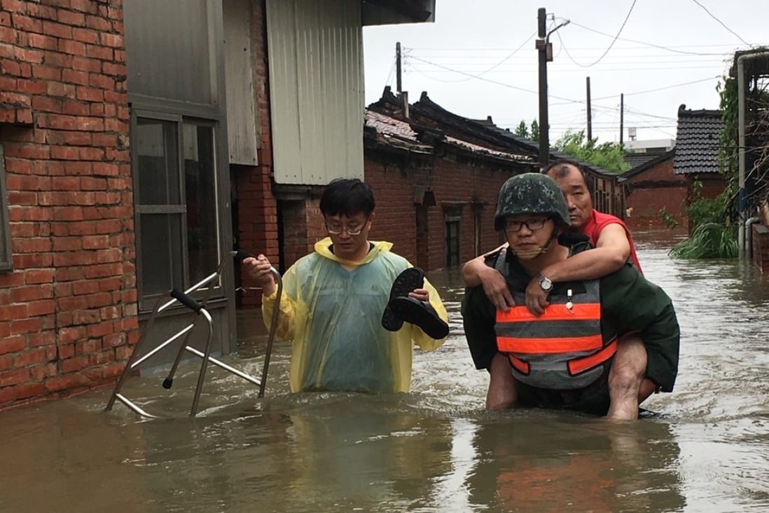 The Taiwanese army helped to evacuate residents in Chiayi county after torrential rain in central and southern Taiwan since Thursday. Photo: CNA