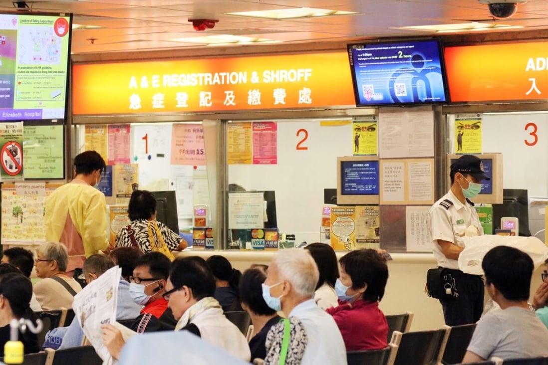 Patients queuing at the accident and emergency unit of Queen Elizabeth Hospital in Yau Ma Tei, where signs are posted in English and Chinese. Photo: Felix Wong