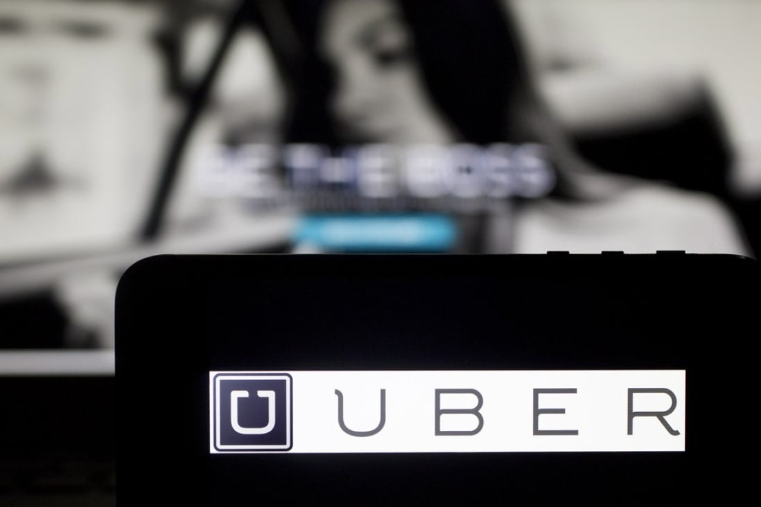 Uber’s ride-sharing services are banned in Japan, though its taxi-hailing technology has given it a foothold in the market. Photo: Bloomberg