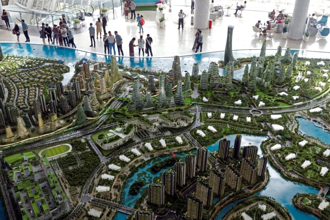 A model of the Forest City development is showcased at a Country Garden showroom in Johor Bahru, Malaysia. Photo: Reuters