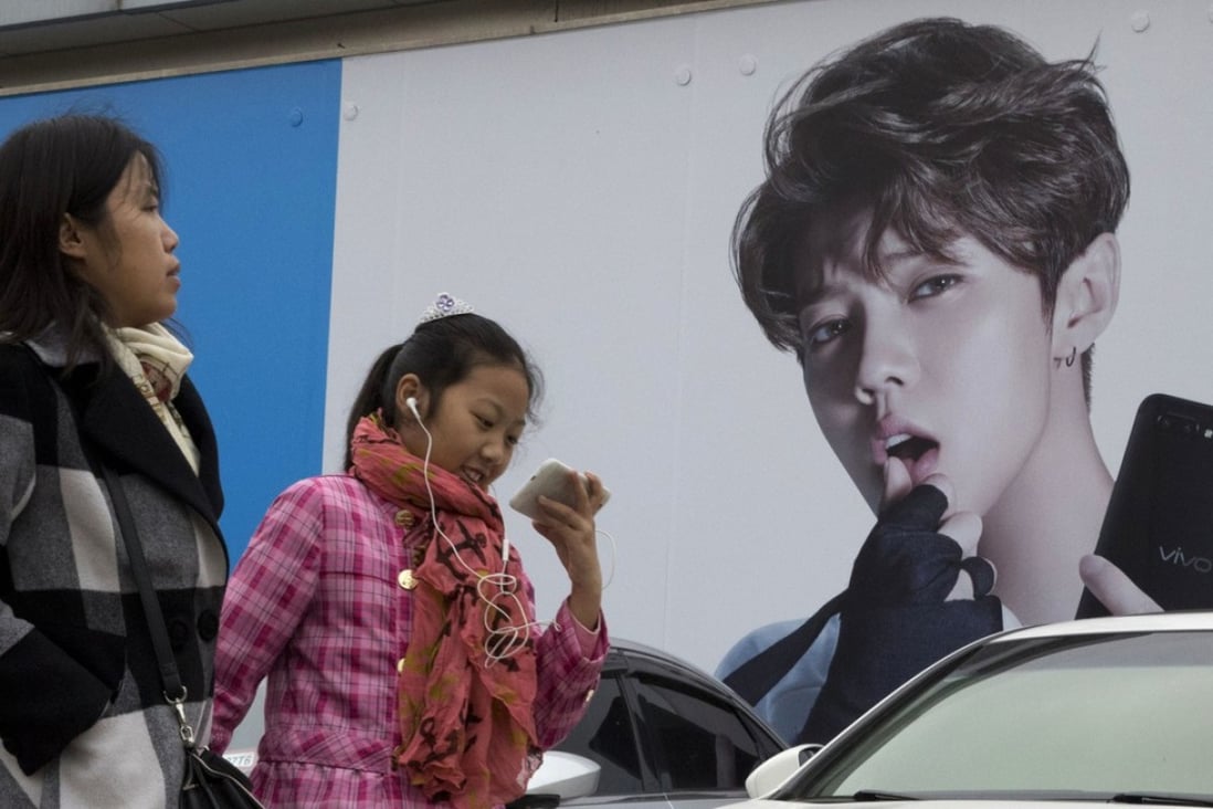 QQ, the grandaddy of China’s social media scene, is reaping the rewards of introducing features that appeal to the country’s Generation Z. Photo: AP.