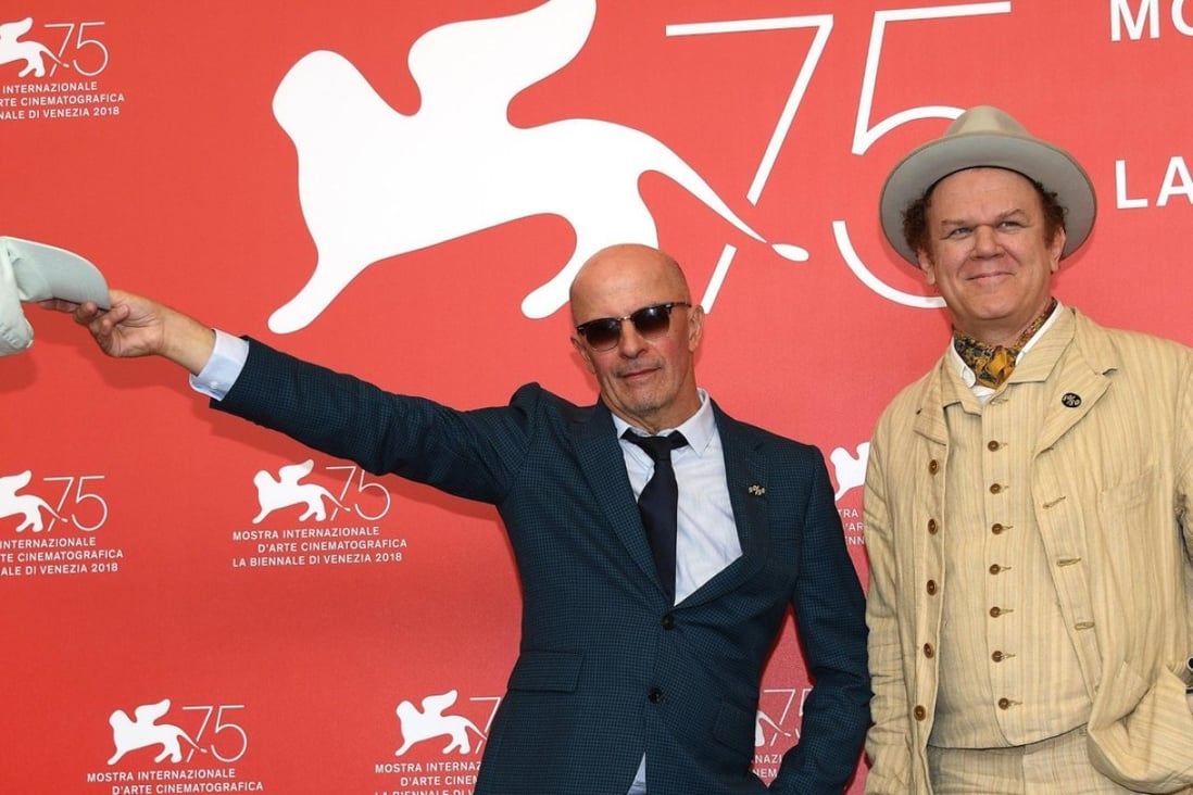 Director Jacques Audiard (left) and actor John C. Reilly at the Venice film festival. Photo: Claudio Onorati/ANSA via AP