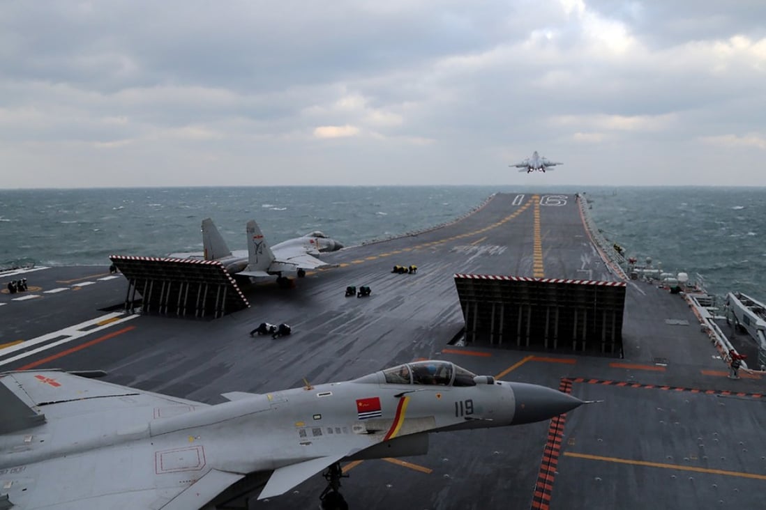 Chinese J-15 fighter jets on the deck of the Liaoning aircraft carrier during a military drill in the Yellow Sea in 2016.. Photo: AFP
