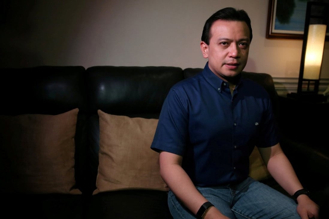 Philippine Senator Antonio Trillanes sitting on the sofa he is sleeping on in his office at the Senate in Pasay City, Metro Manila on September 7, 2018. Photo: Reuters