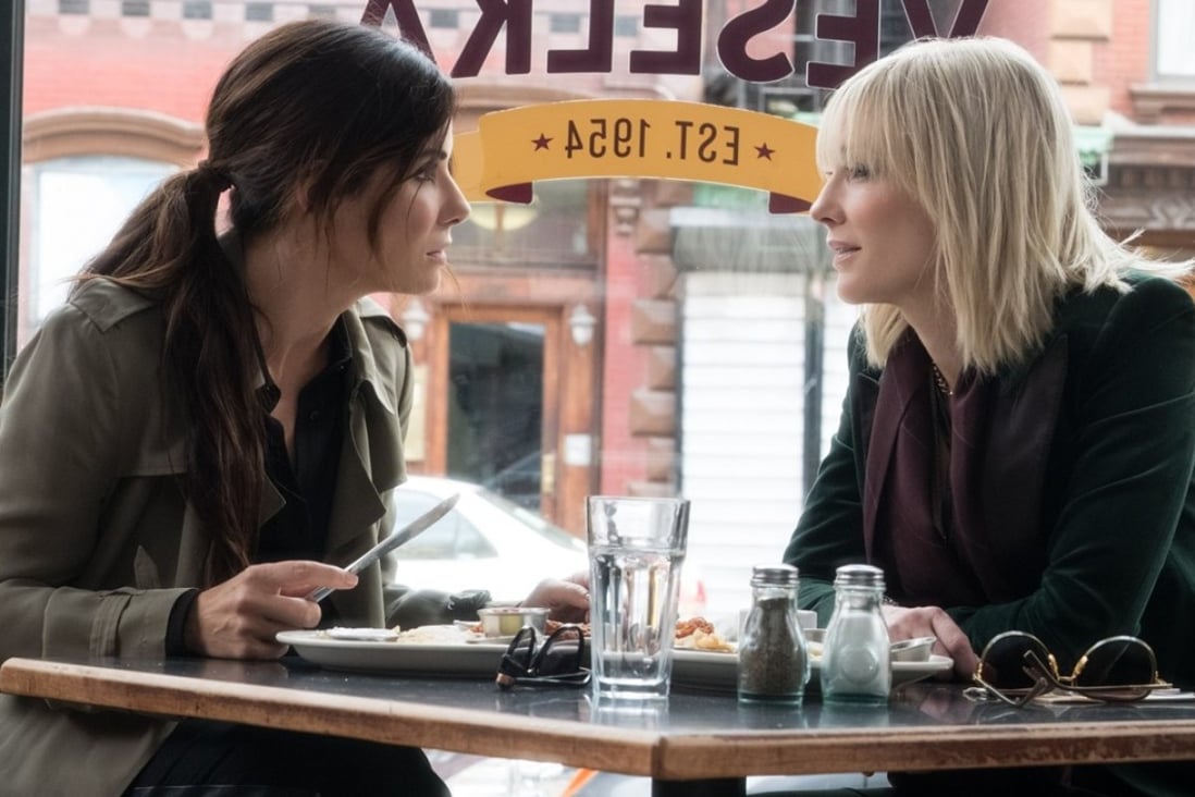 Sandra Bullock and Cate Blanchett in a scene from Ocean's 8, like Crazy Rich Asians a non-superhero Warner Bros. summer release.
