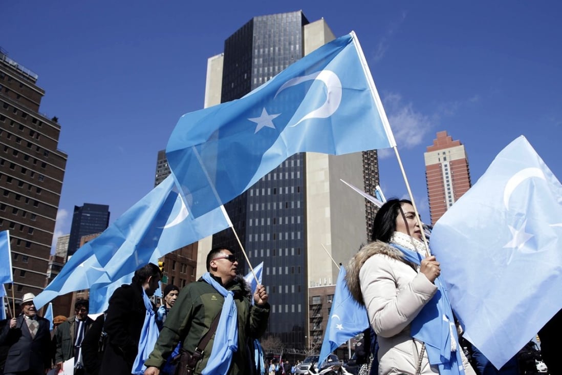 Uygurs marching to the Permanent Mission of China to the United Nations in New York on March 15, part of demonstrations around the world to protest China’s surveillance and security campaign that has sent thousands into detention and political indoctrination centres in Xinjiang. Photo: AP