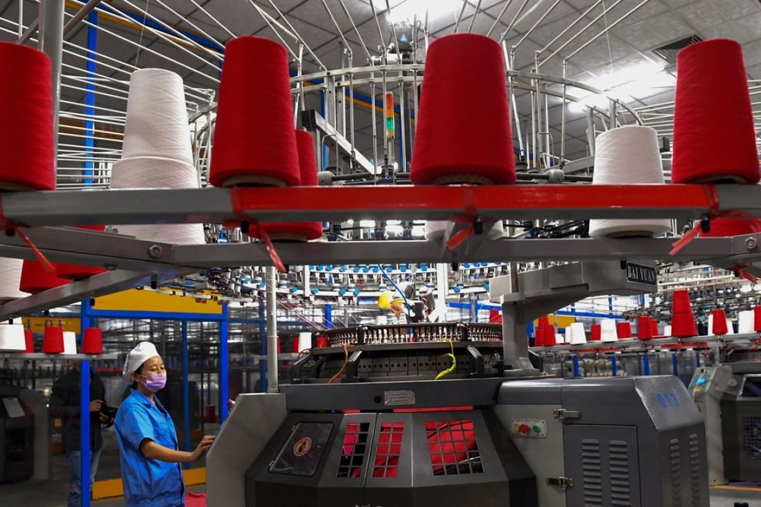 Factory output continued to rise, hitting 6.1 per cent. Photo: STR / AFP