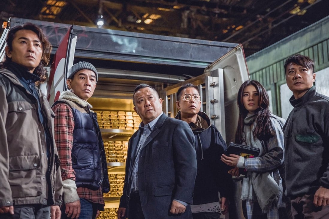 Young and Dangerous alumni Ekin Cheng (far left), Jordan Chan (second from left), Jerry Lamb (third from right) and Chin Ka-lok (far right), who also directs, are joined by producer Eric Tsang (third from left) in a still from Golden Job (category IIA; Cantonese).