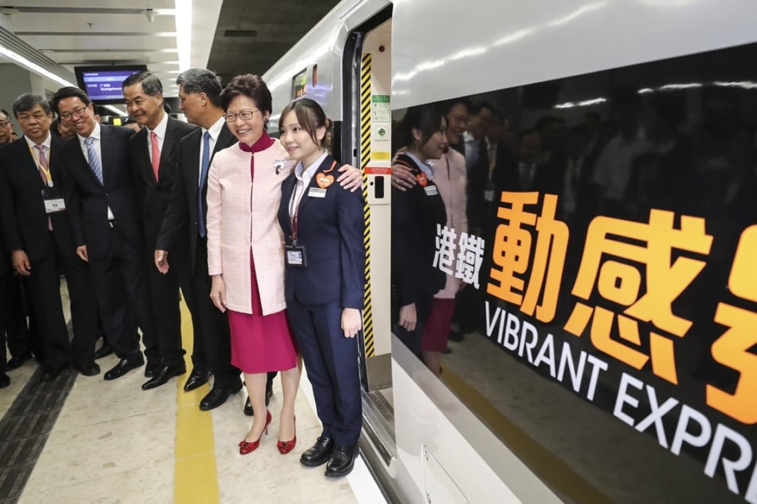 Chief Executive Carrie Lam (second from right) poses with guests before setting off on the first cross-border train. Photo: Edward Wong