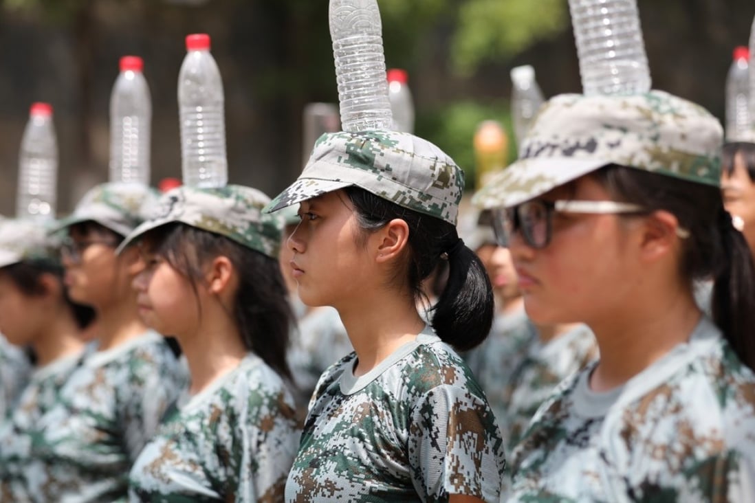 High school pupils from Hengyang in the central Chinese province of Hunan take part in a military training exercise. Photo: Xinhua