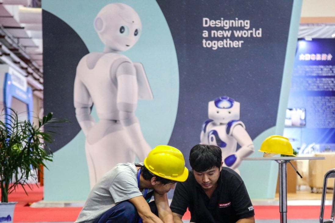 A promise to build a new world together at the World Robot Conference in Beijing. Robotics is one of the areas China has targeted in its Made in China 2025" industrial master plan, which aims at controlling the domestic market in a series of hi-tech areas, much to the annoyance of the US. Photo: AP