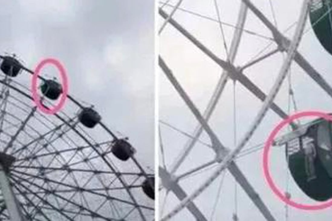 A five-year-old boy is trapped by his head after climbing out the window of a 42 metre Ferris wheel in Taizhou, Zhejiang province. Photo: Sina