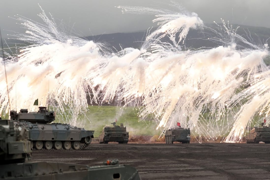 Japanese tanks during a live fire exercise near Mount Fuji in August, 2018. Photo: Bloomberg